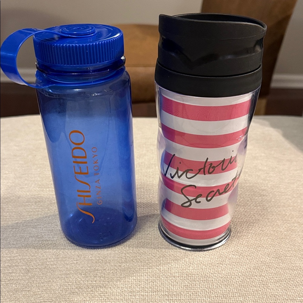 Blue Shiseido Water Bottle and Pink Striped Victoria's Secret Tumbler